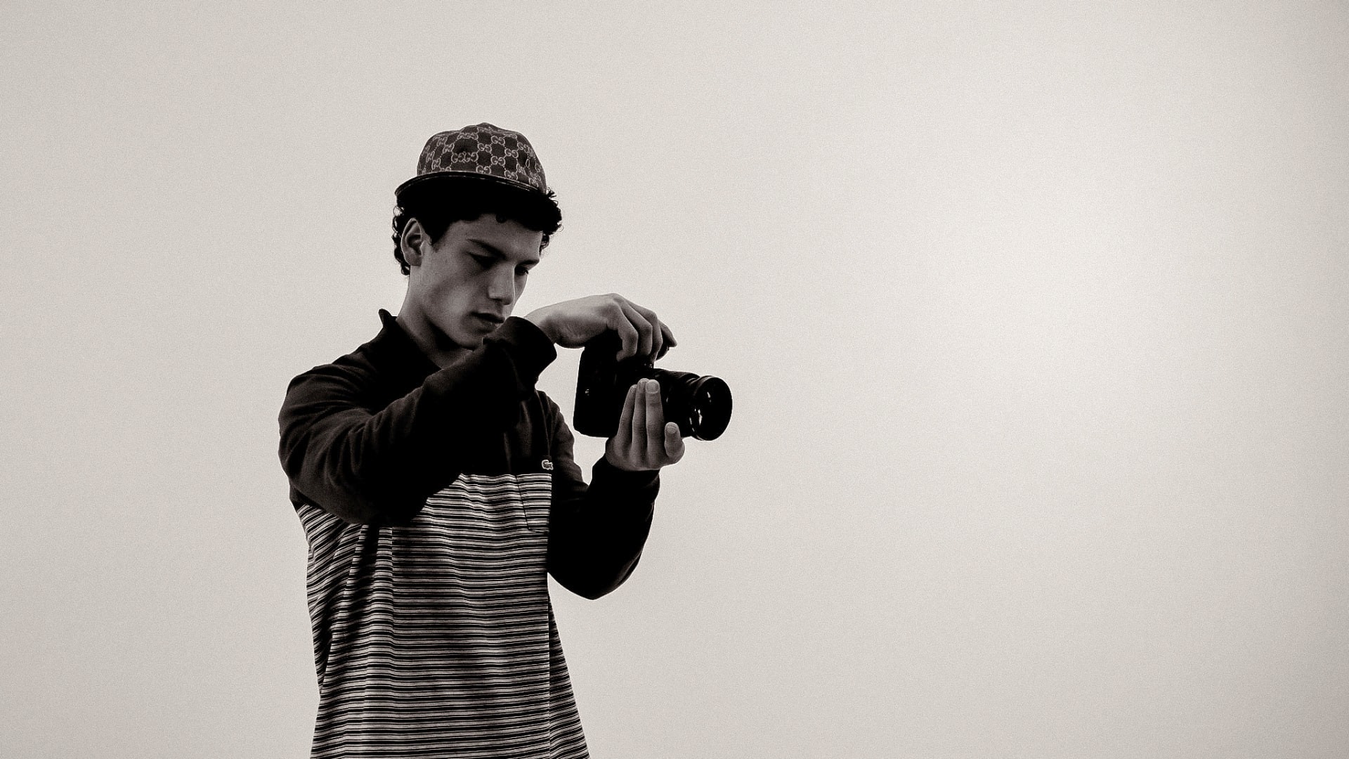 Salih Basce holding a camera
